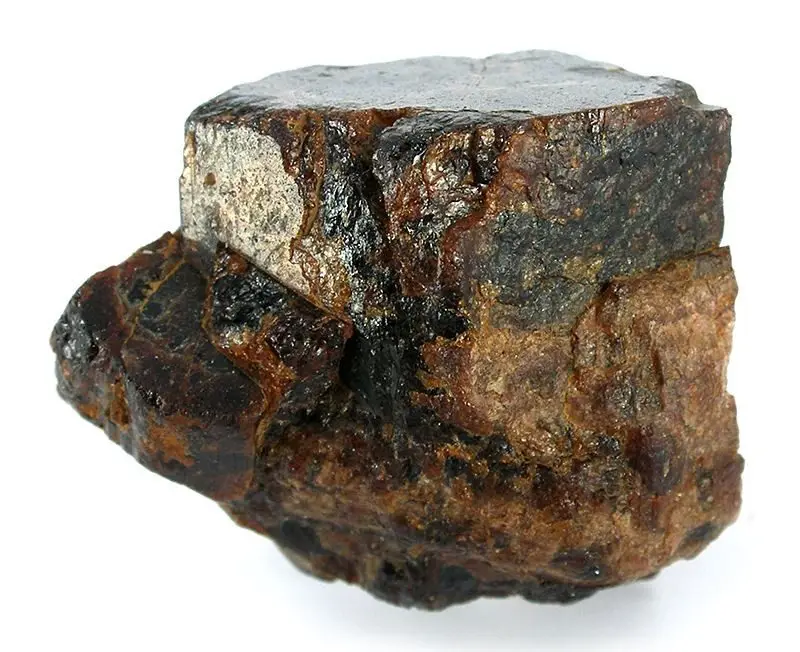 A dark brown bastnäsite crystal on matrix